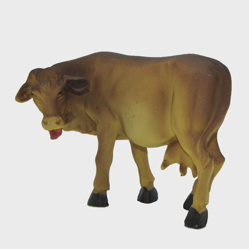 Krippenfigur Bäuerin mit Kuh beim Melken